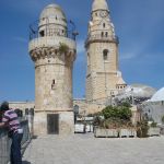 Минарет мечети и колокольня церкви Успения на горе Сион в Иеруслалиме. © Фото Натальи Ковровой