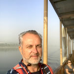 Руководитель паломнической службы "Россия в красках" в Иерусалиме Павел Платонов на лодке на море Галилейском